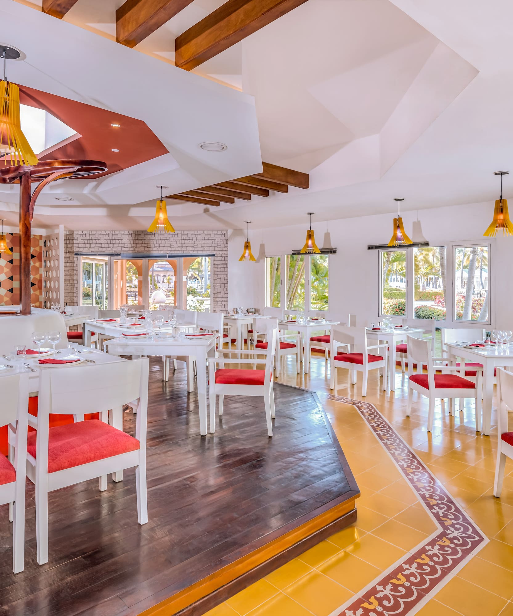 a room with tables and chairs