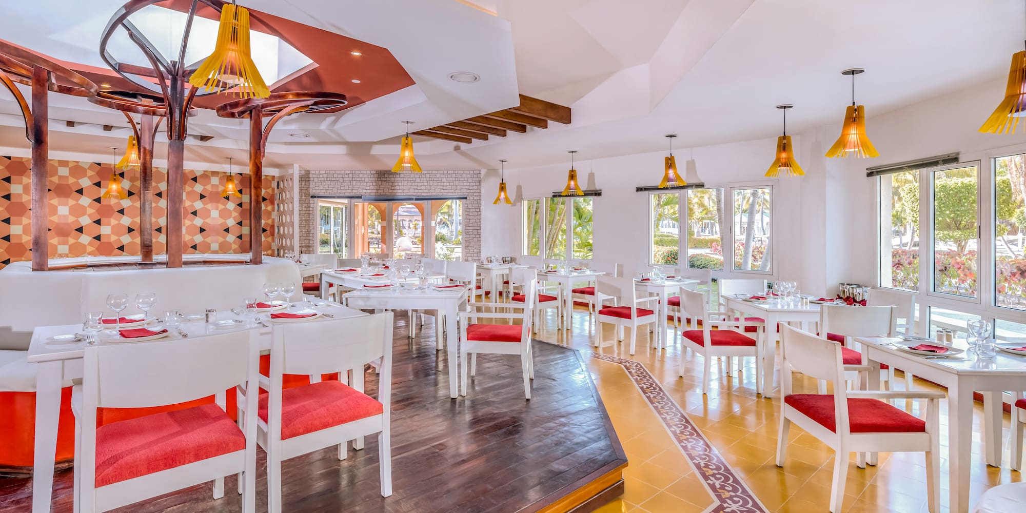 a room with tables and chairs