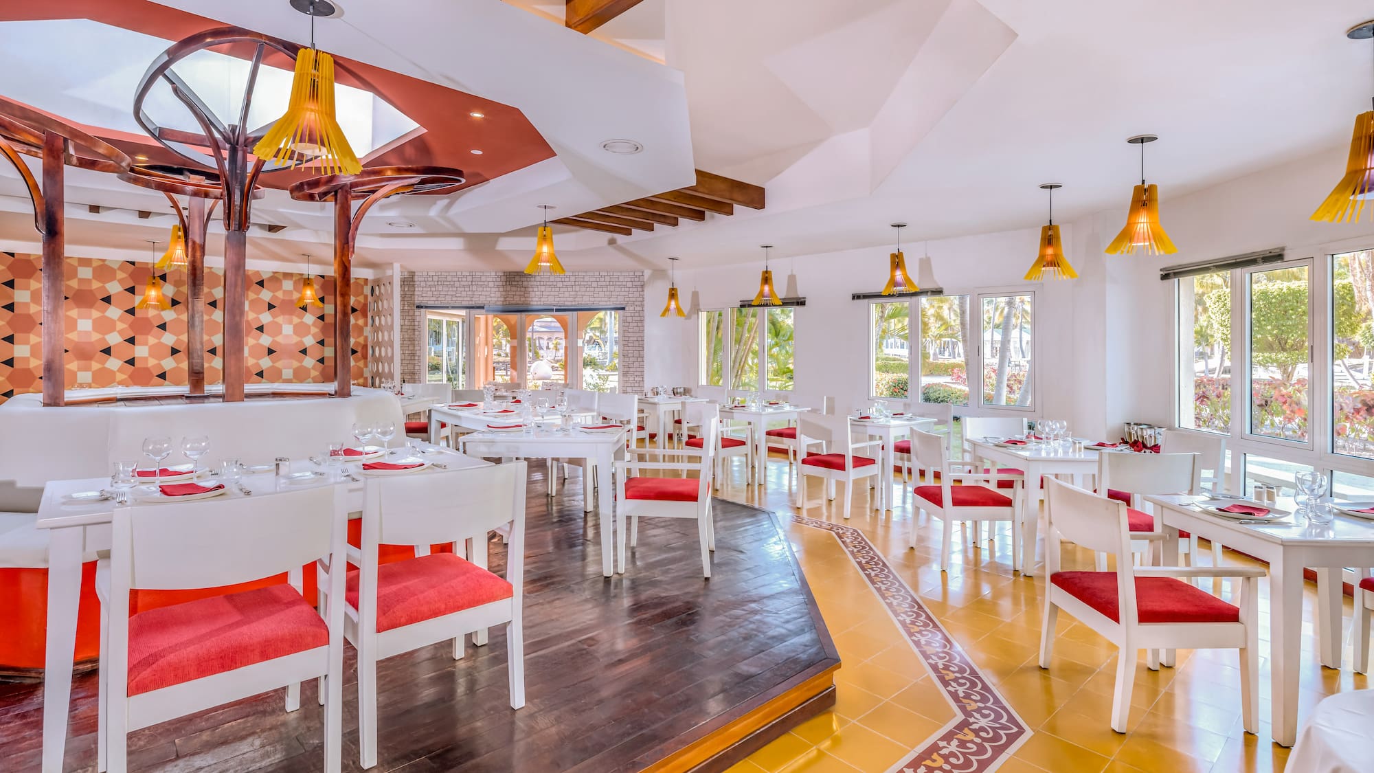 a room with tables and chairs