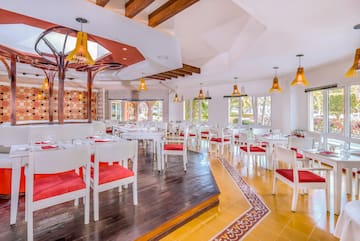 a room with tables and chairs