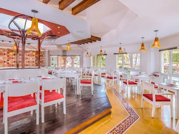 a room with tables and chairs