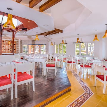 a room with tables and chairs