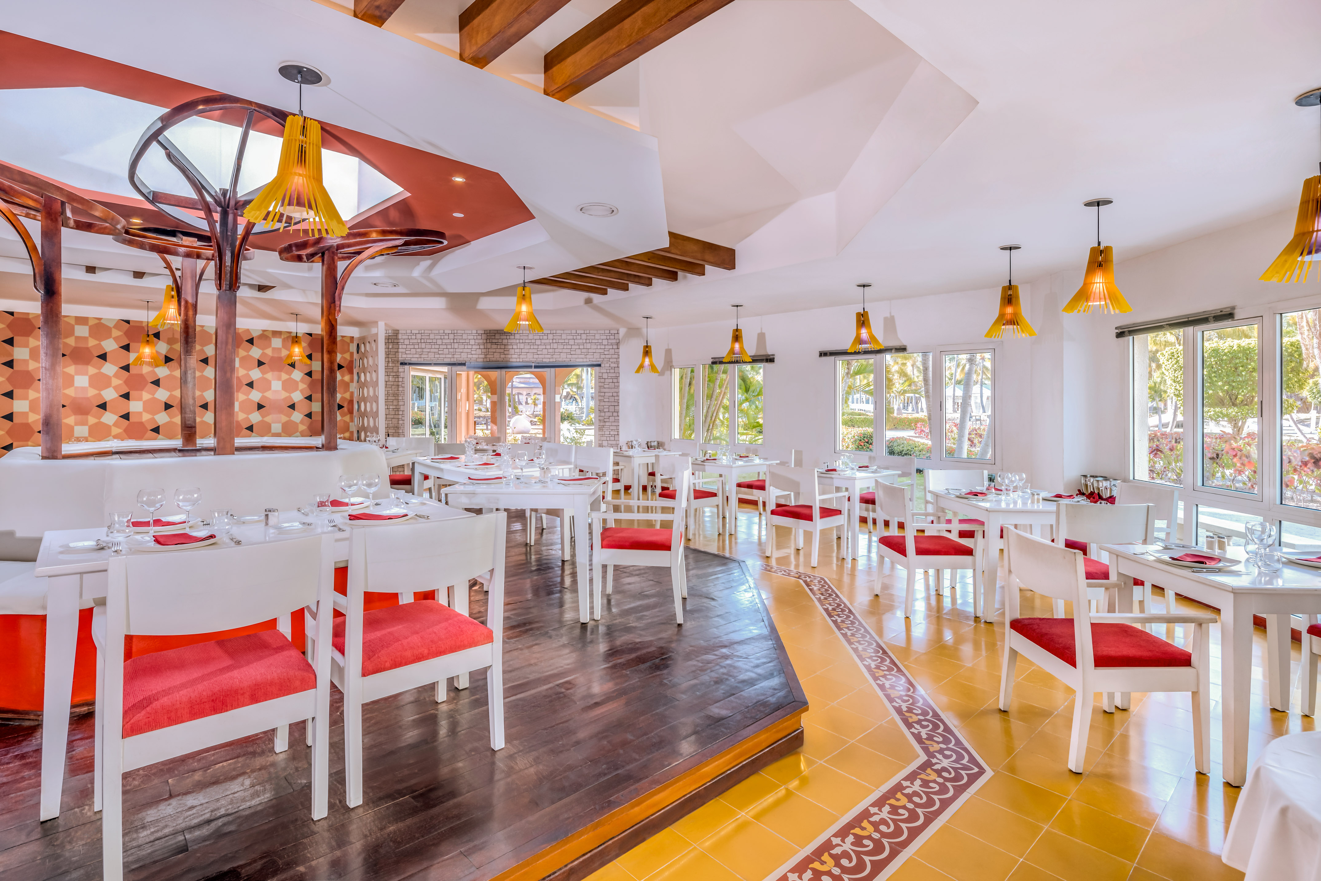 a room with tables and chairs