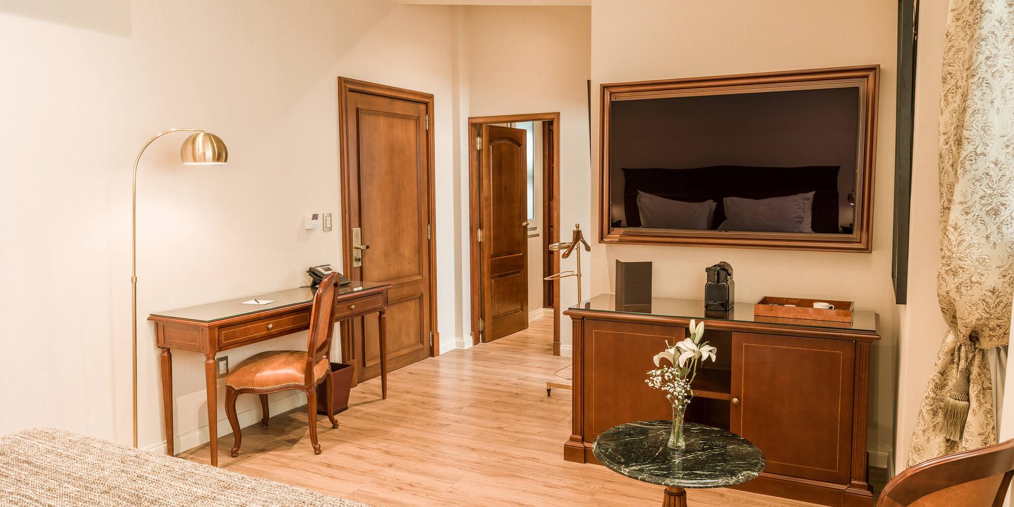 a room with a television and a table