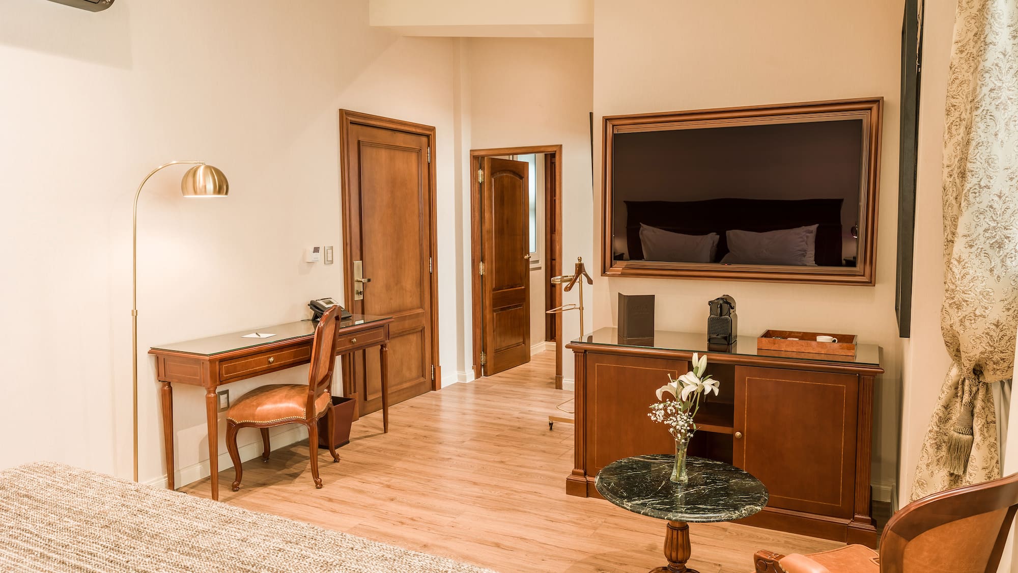 a room with a television and a table