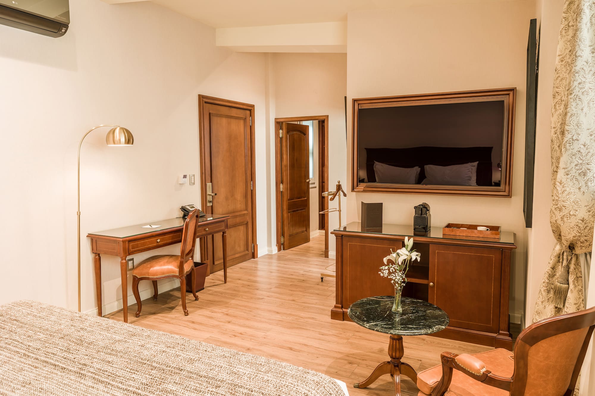 a room with a television and a table