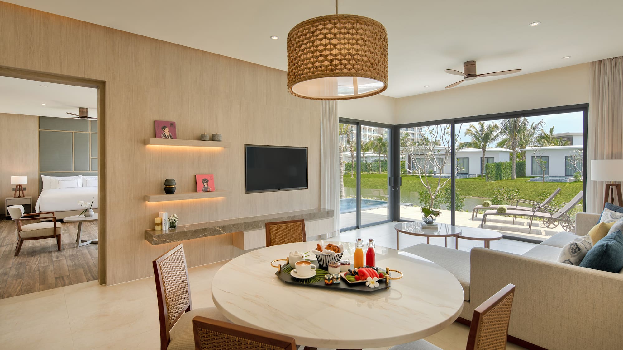 a dining room with a table and chairs
