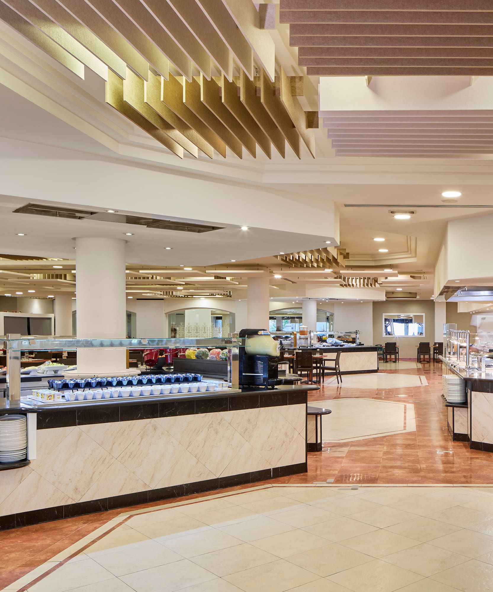 a restaurant with food on the counter