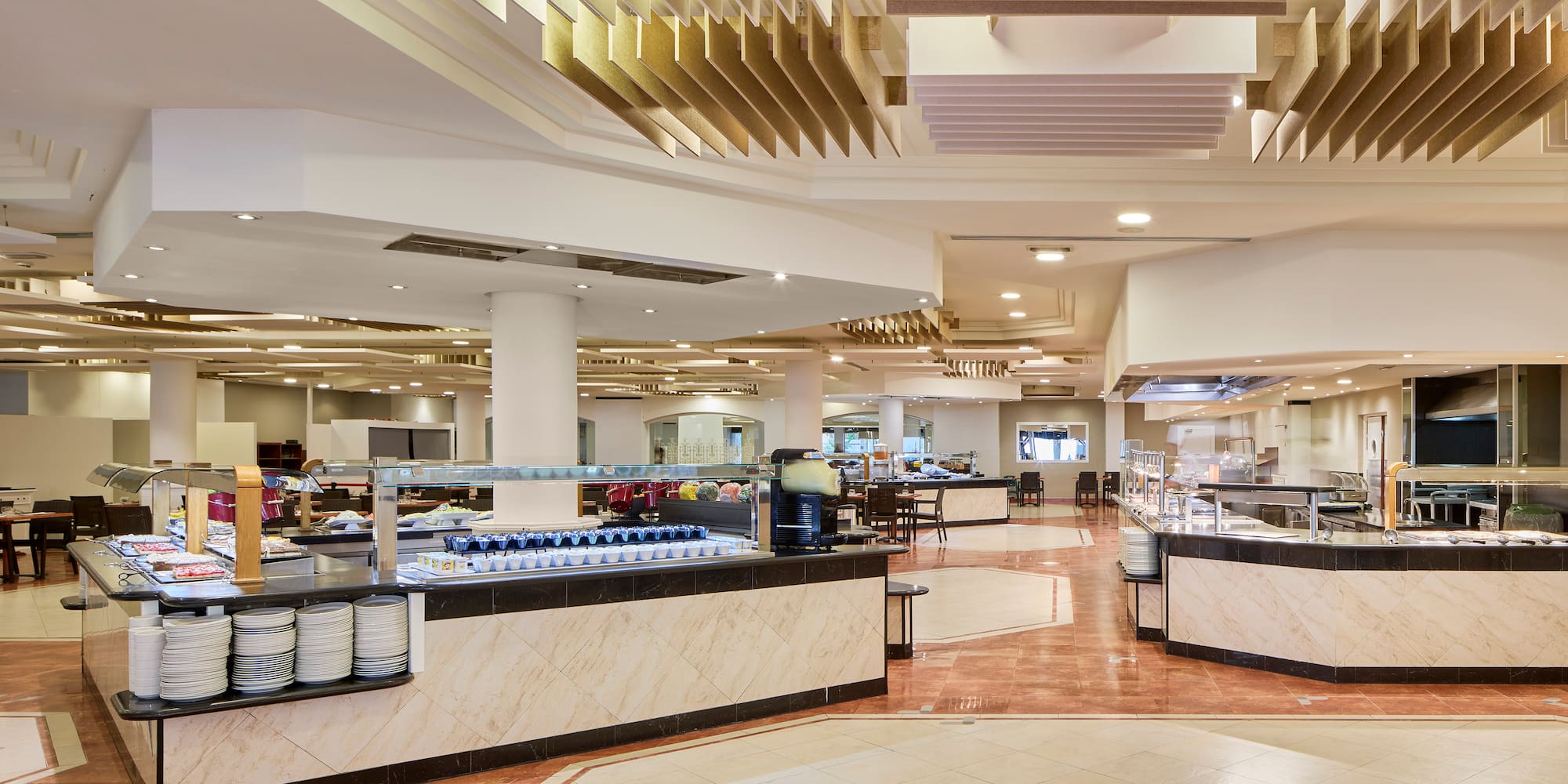 a restaurant with food on the counter