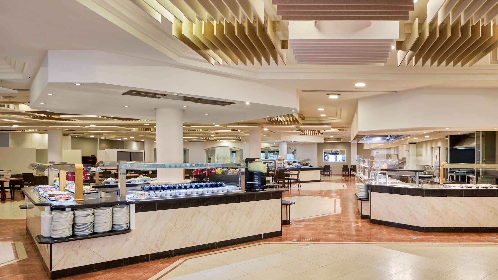 a restaurant with food on the counter