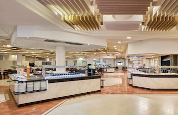 a restaurant with food on the counter