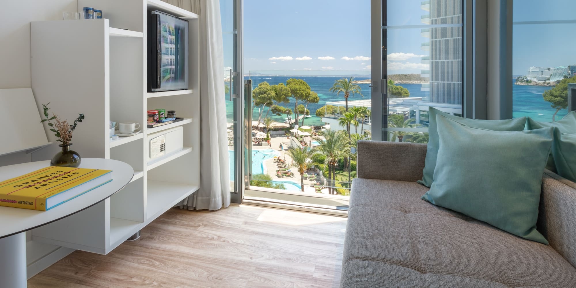 a living room with a couch and a window