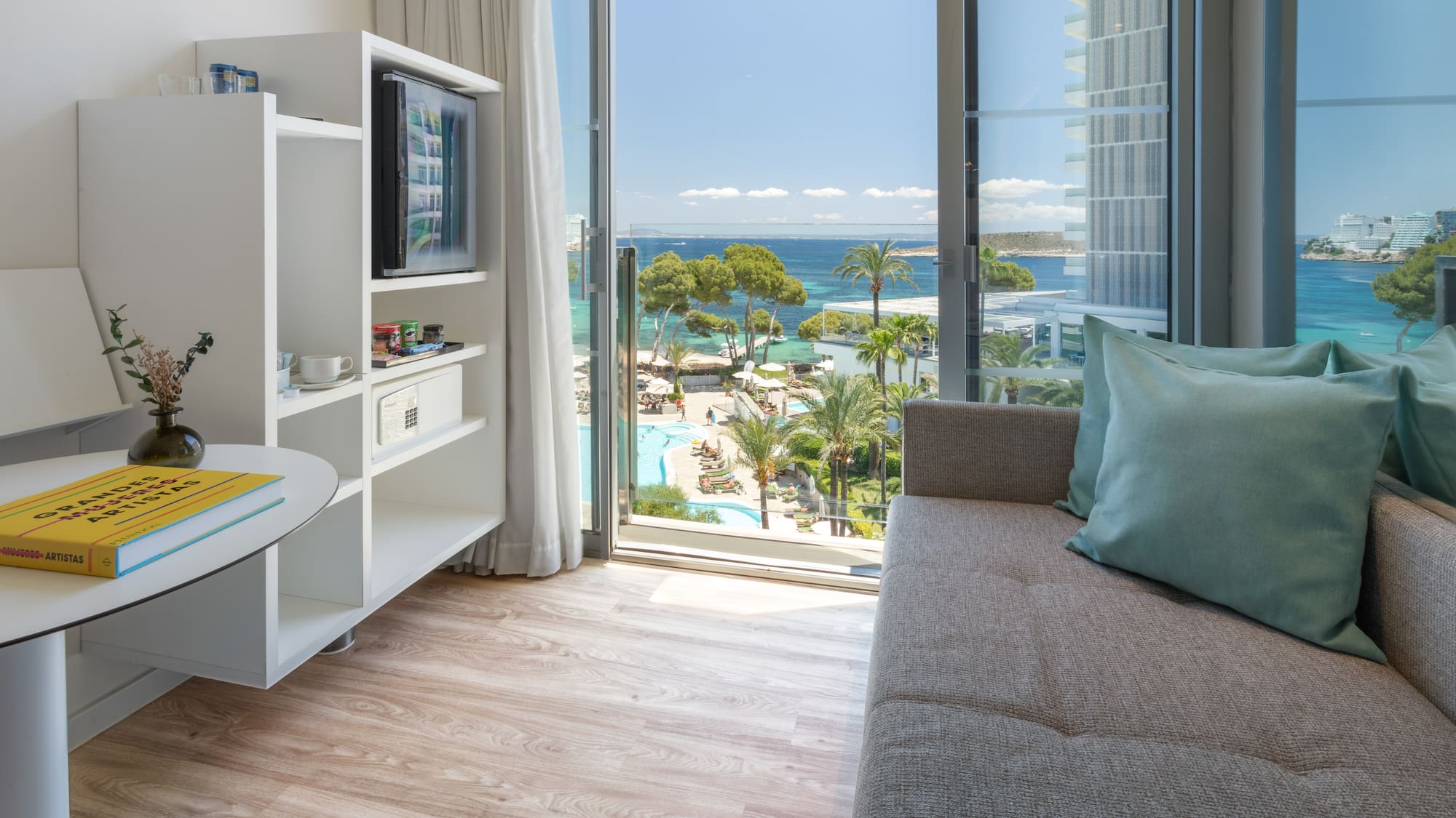 a living room with a couch and a window