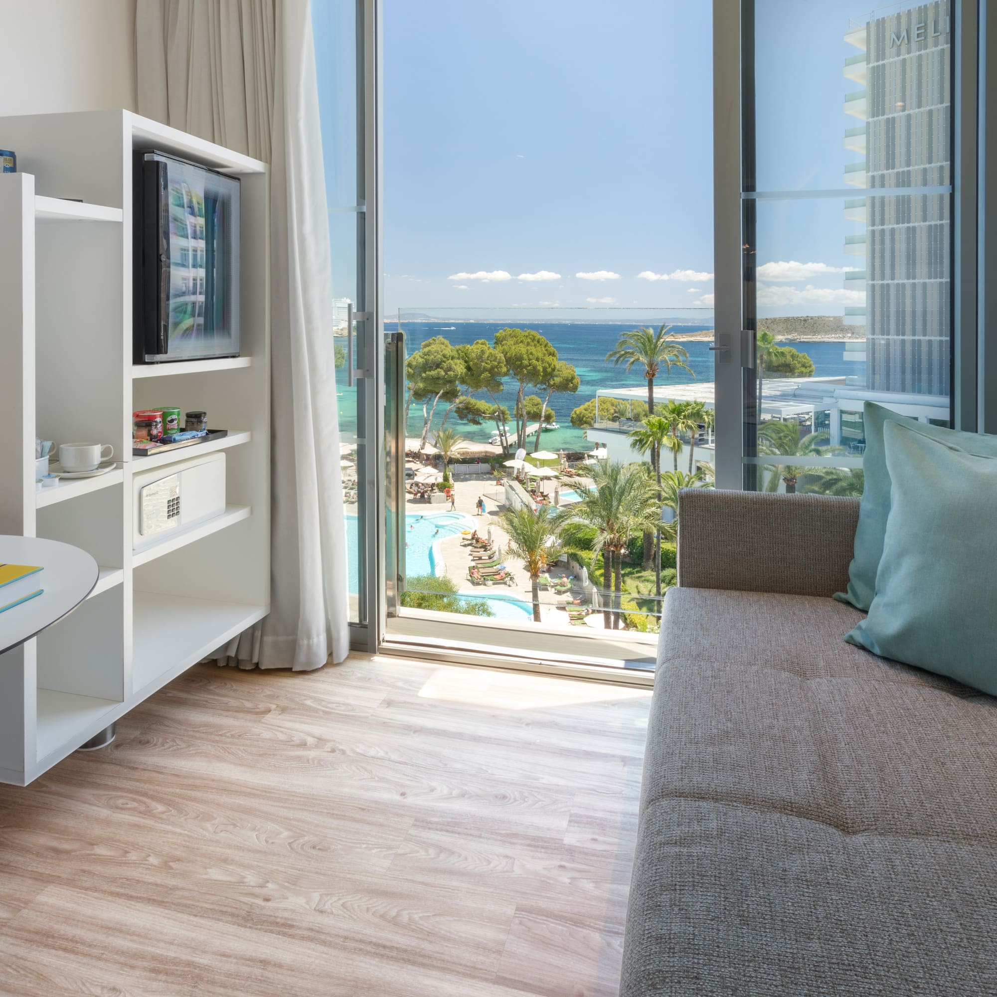 a living room with a couch and a window