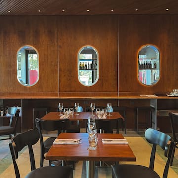 a restaurant with tables and chairs