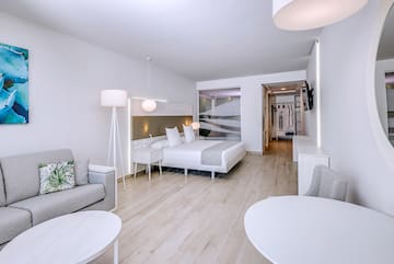 a room with a bed and a couch