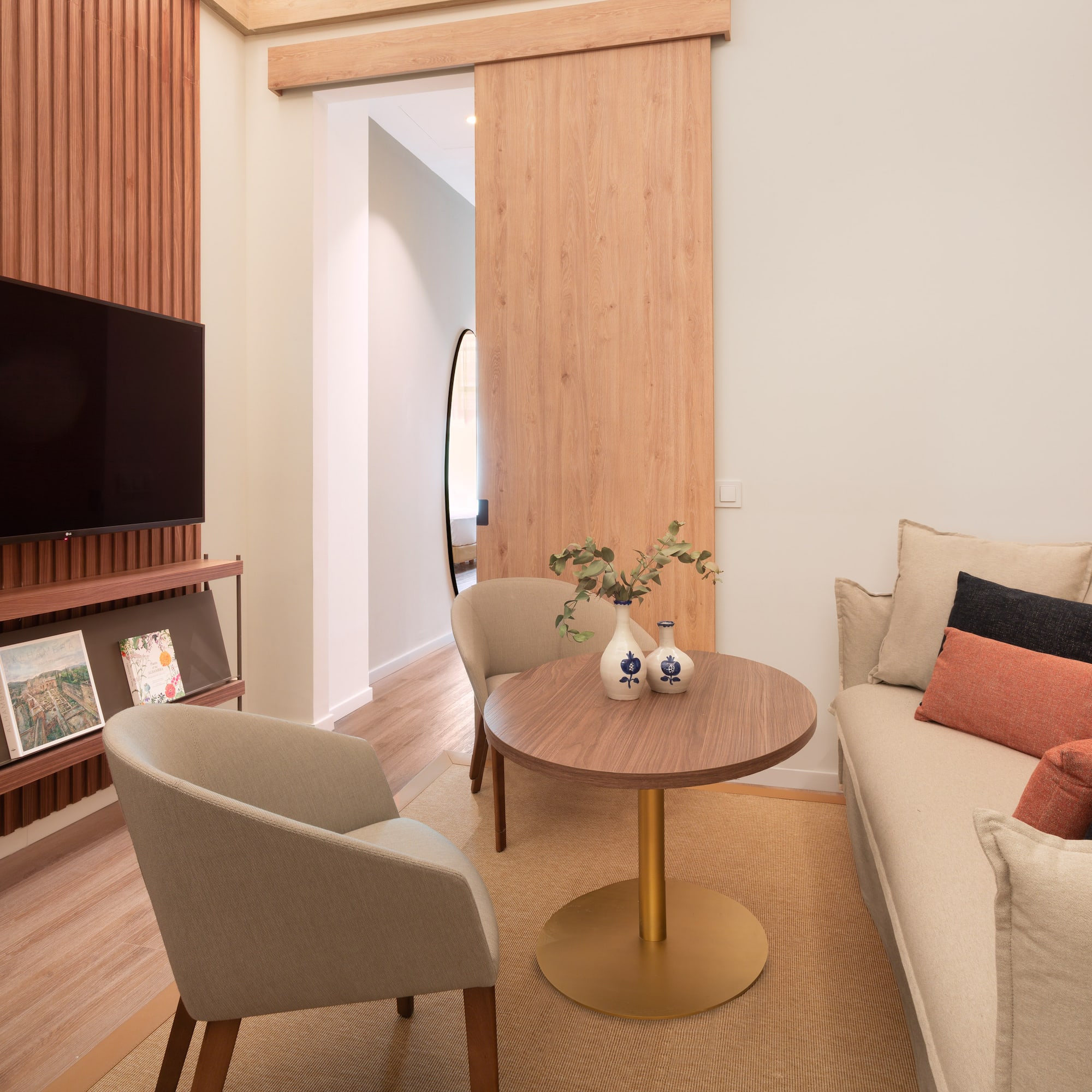 a living room with a couch and a table