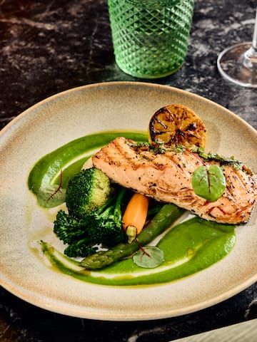 a plate of food on a marble table