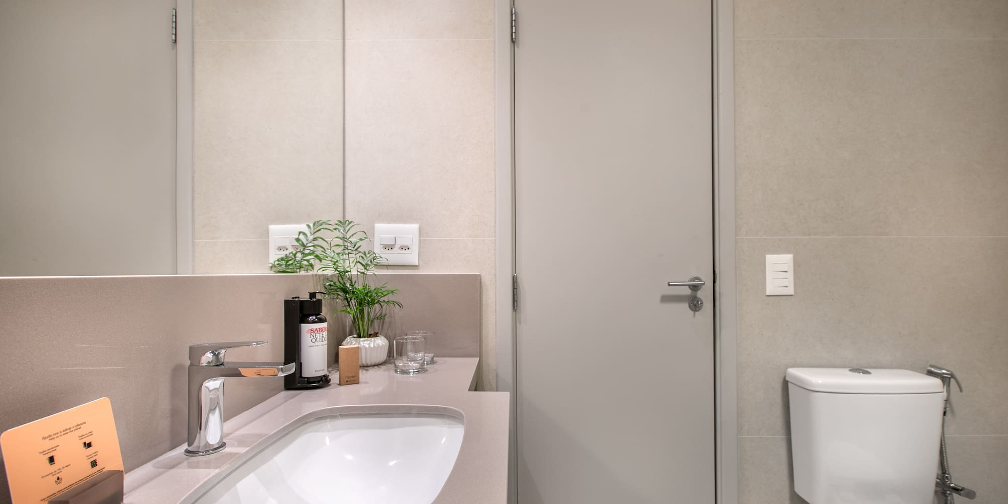 a bathroom with a sink and toilet