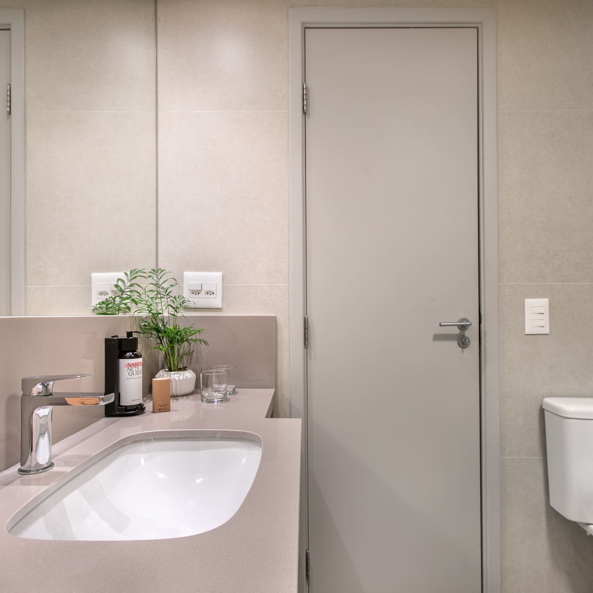 a bathroom with a sink and toilet