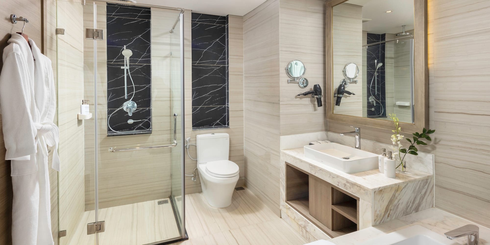 a bathroom with a shower and toilet