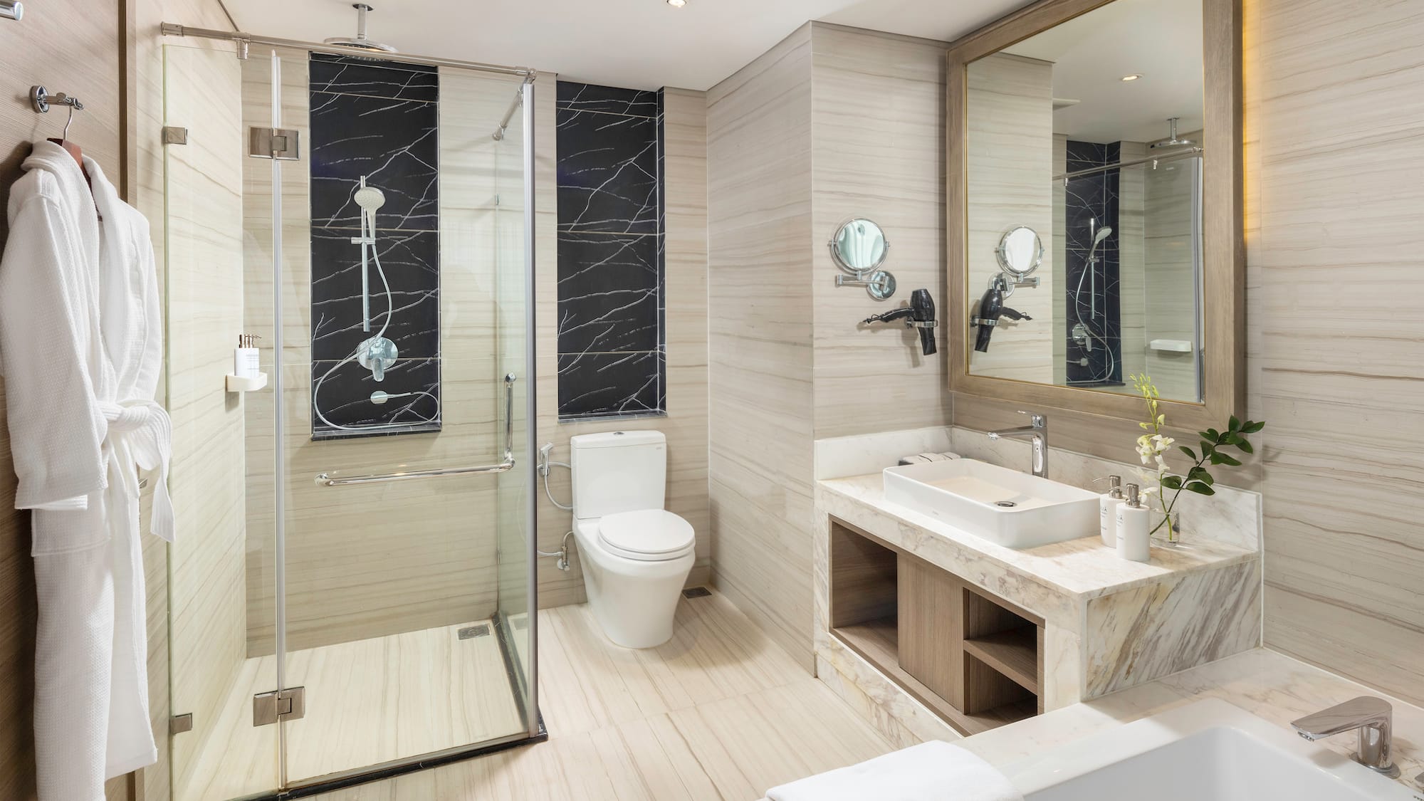 a bathroom with a shower and toilet