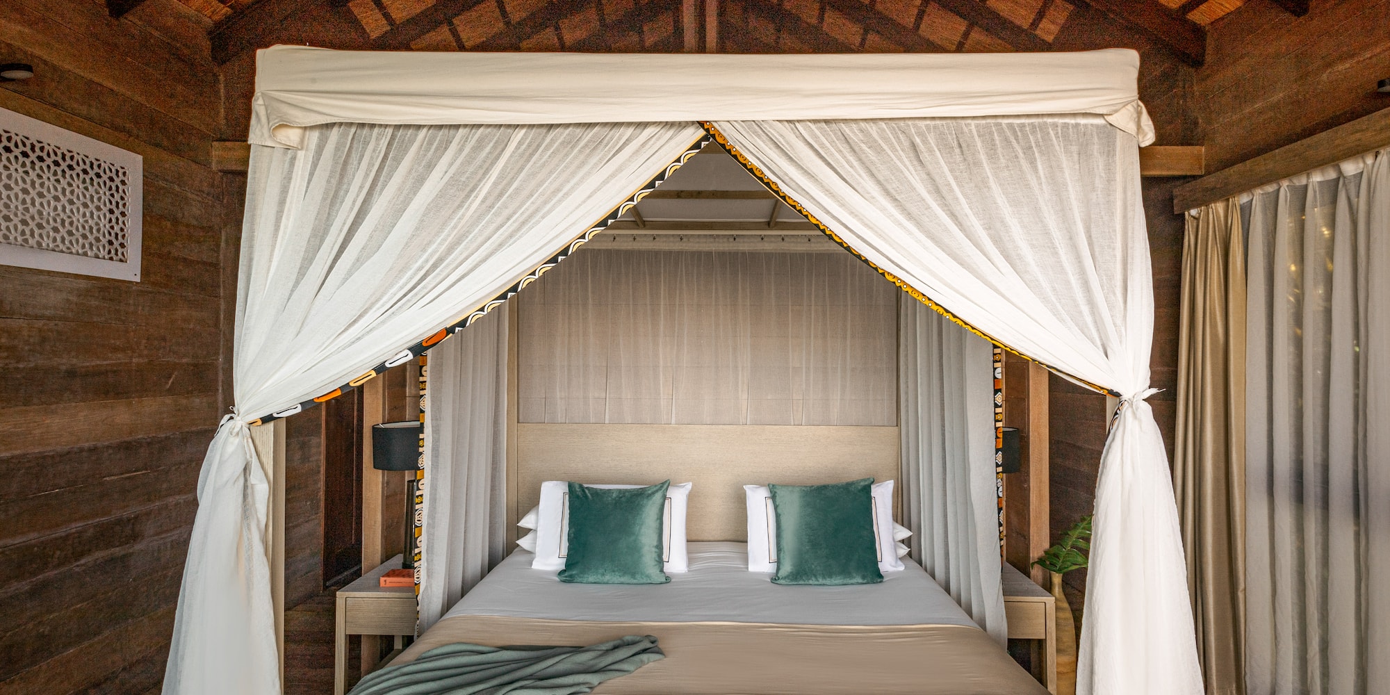 a bed with a canopy over it