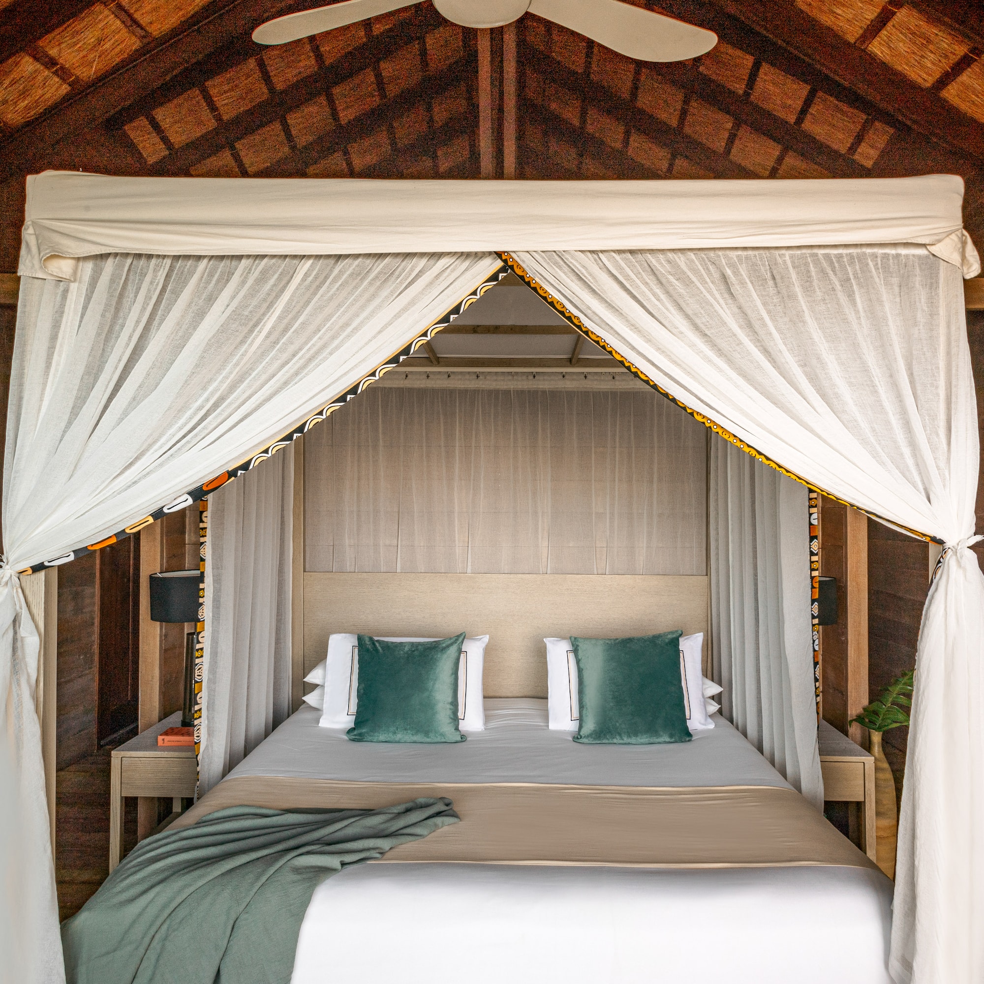 a bed with a canopy over it