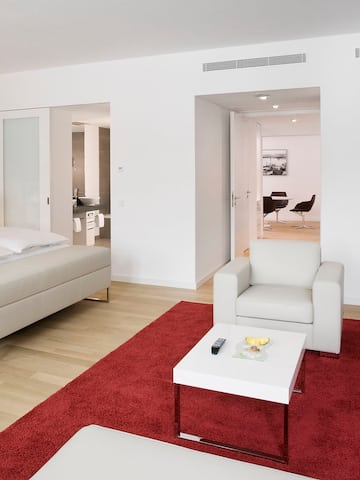 a room with a bed and a couch