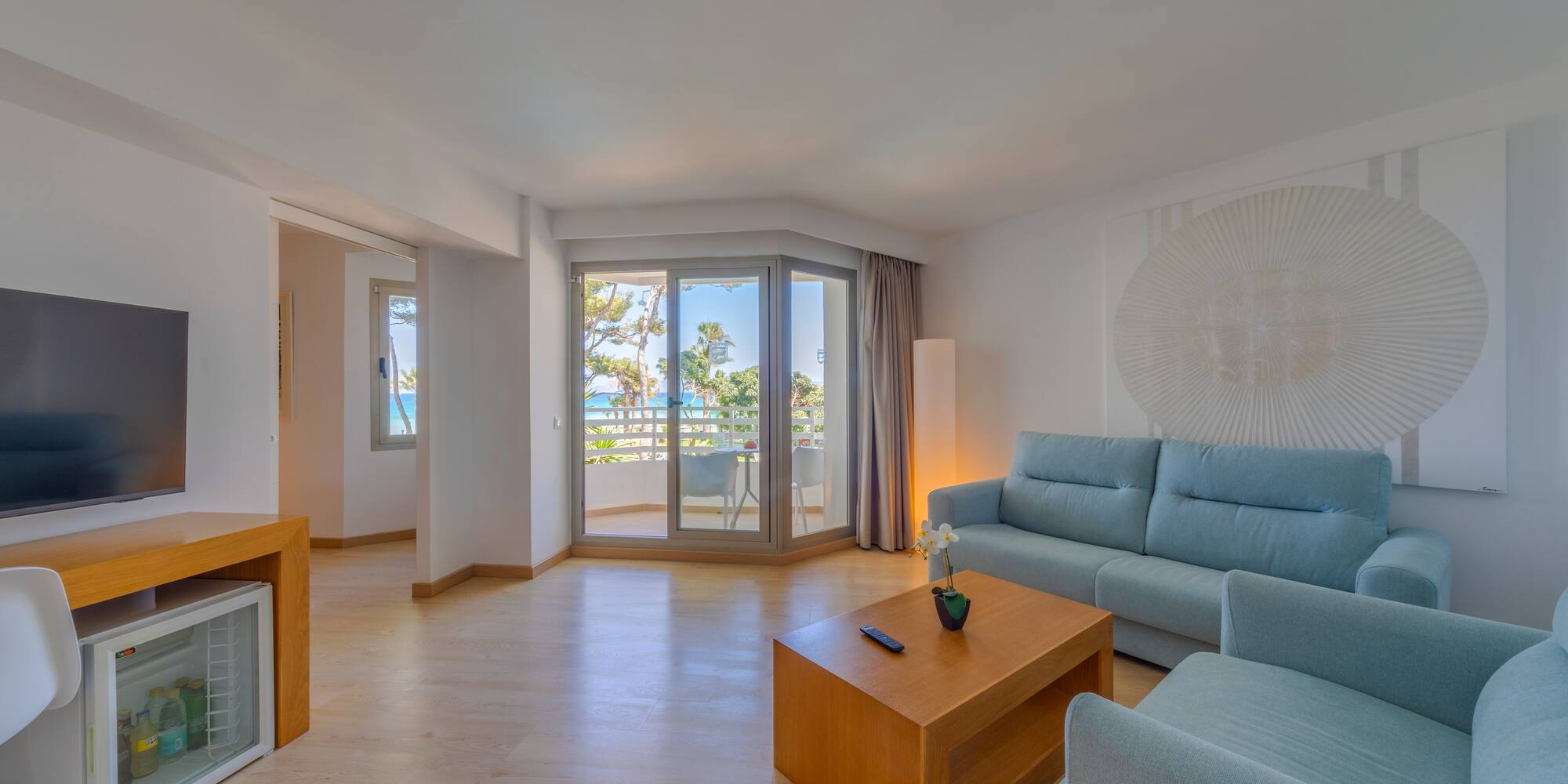 a living room with a couch and a table