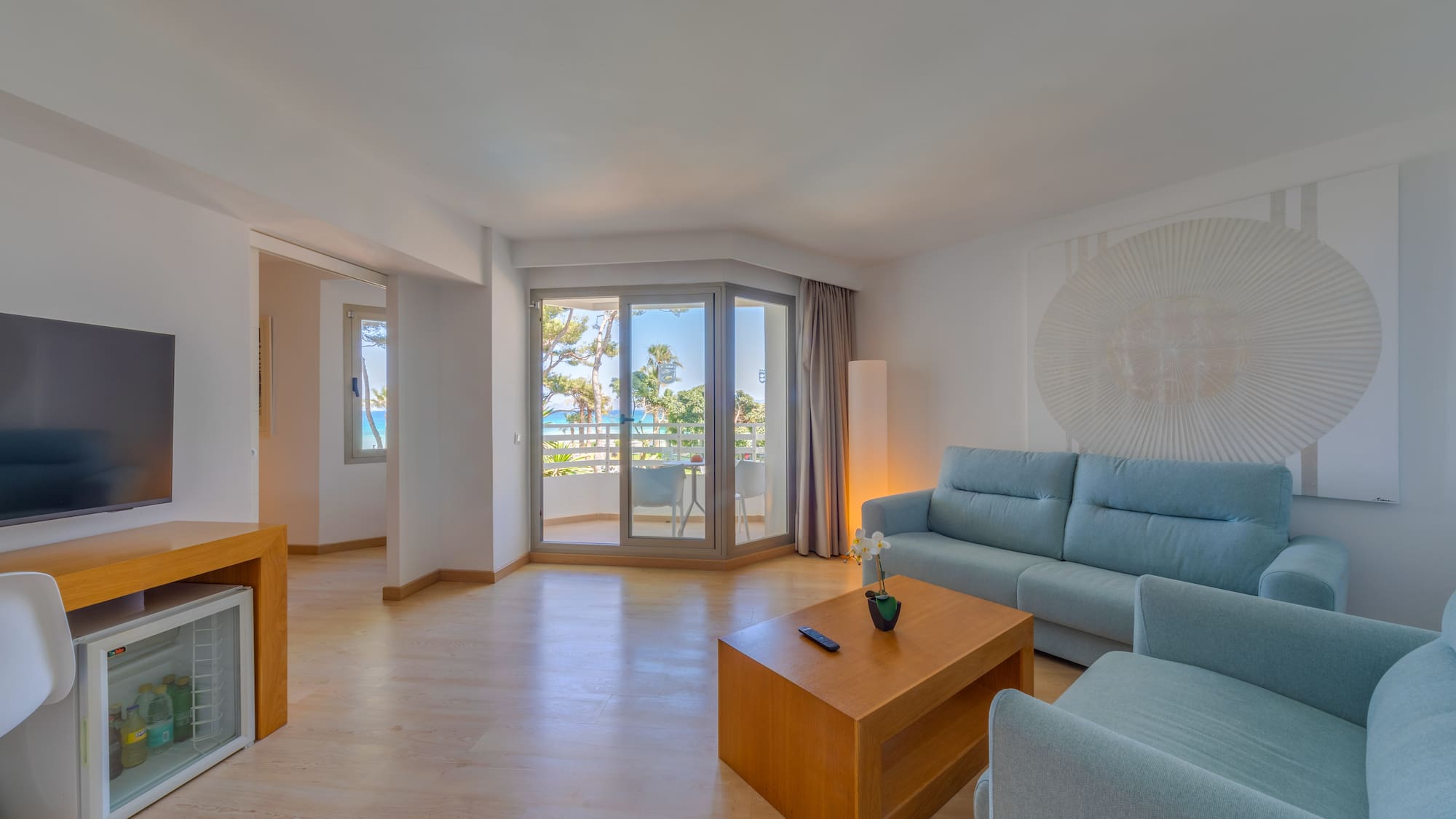 a living room with a couch and a table