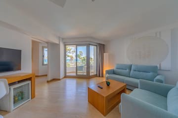 a living room with a couch and a table