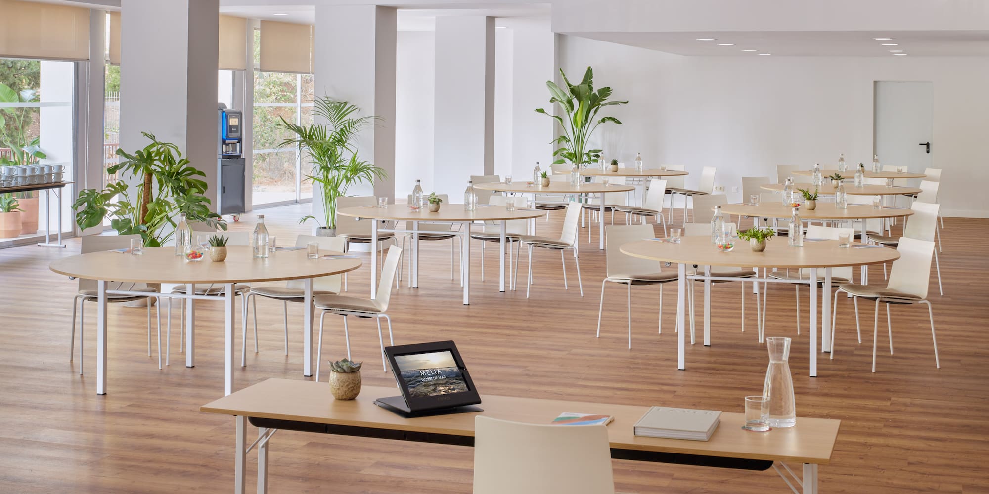 a room with tables and chairs