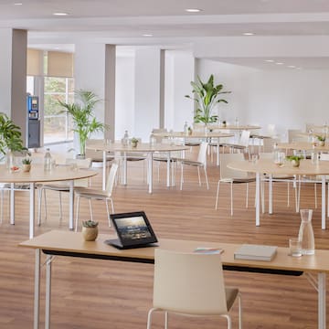 a room with tables and chairs