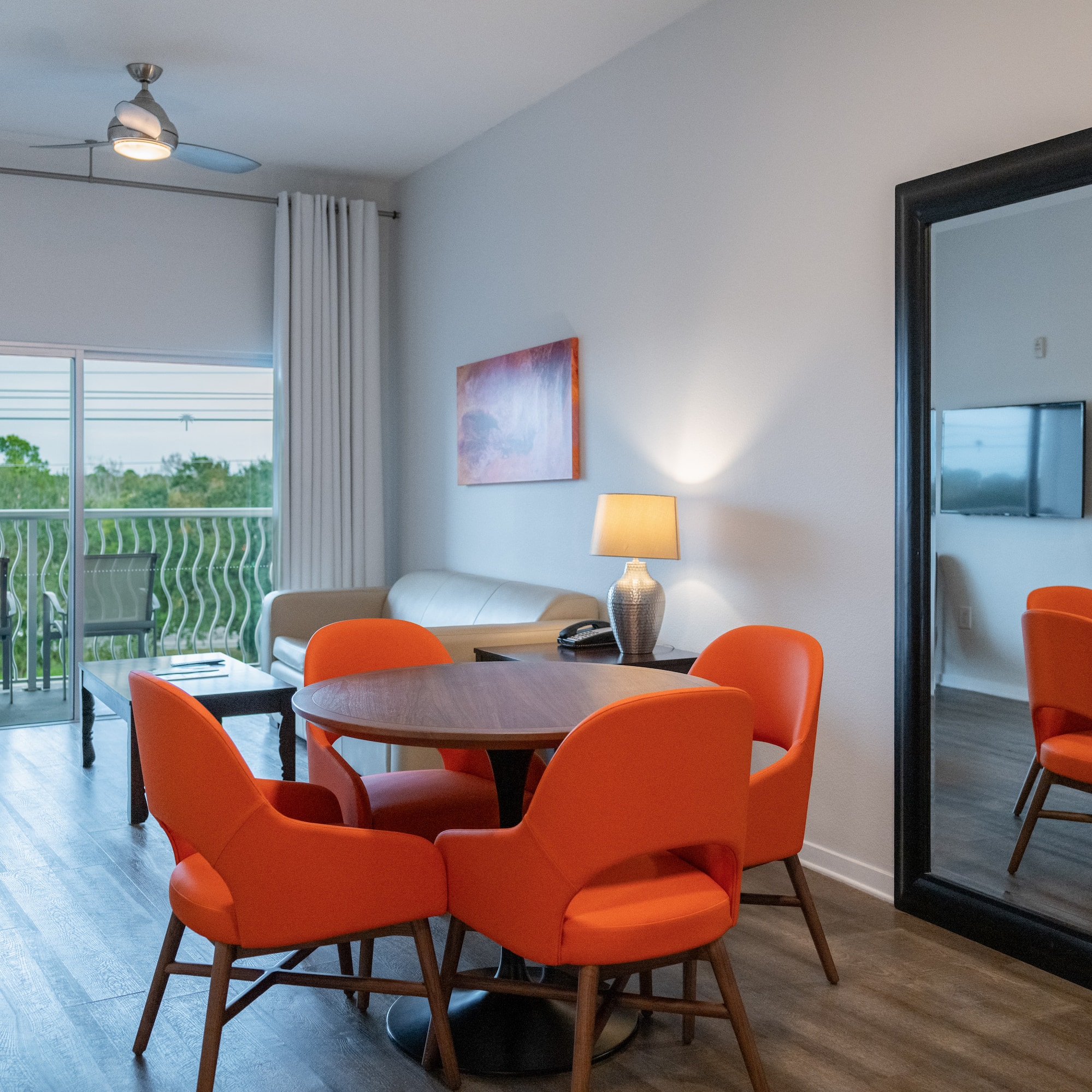 a room with a table and chairs