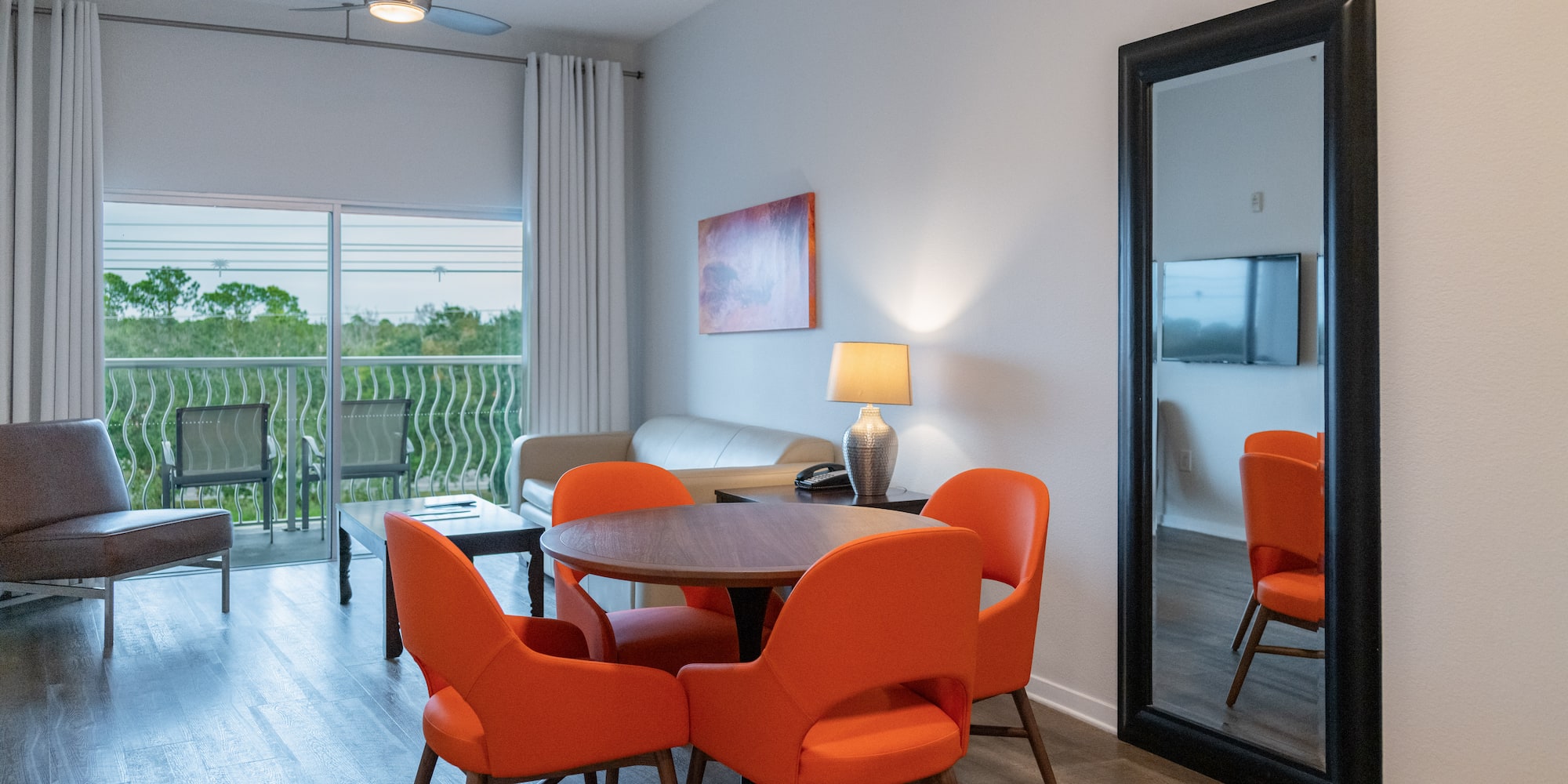 a room with a table and chairs