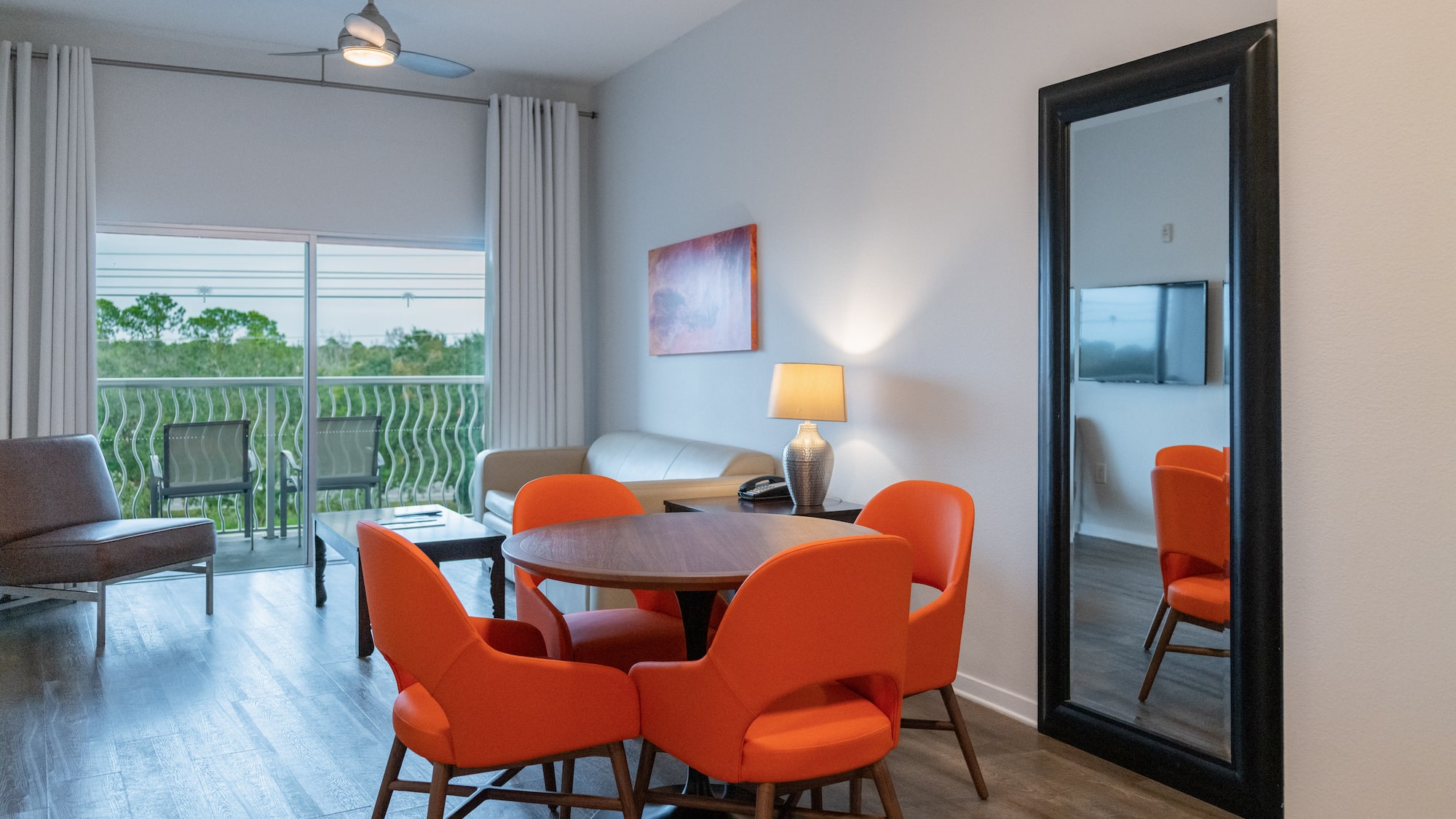 a room with a table and chairs