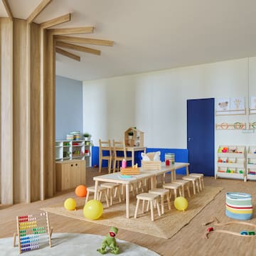 a room with a table and chairs