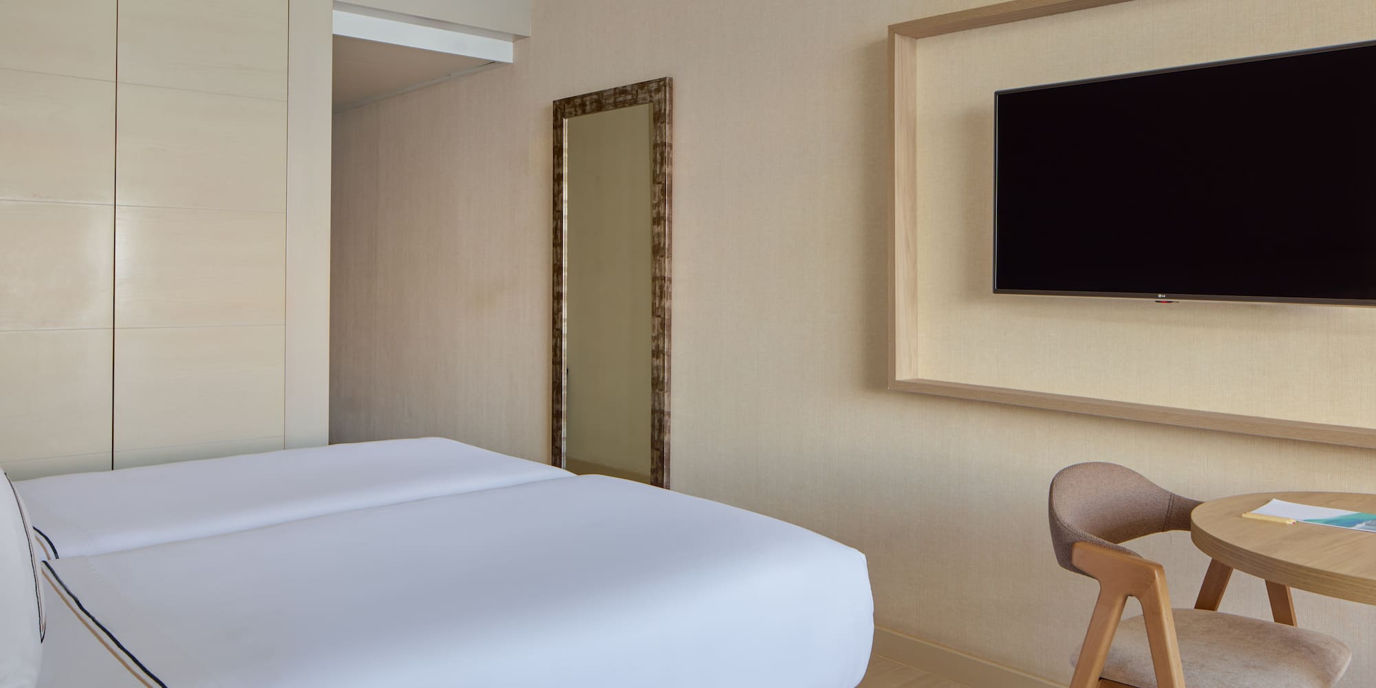 a room with a bed and a chair