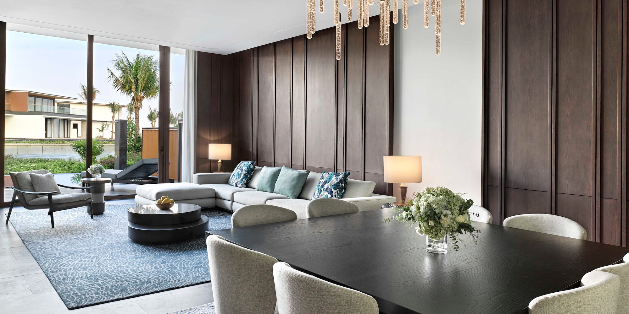 a room with a large table and chairs