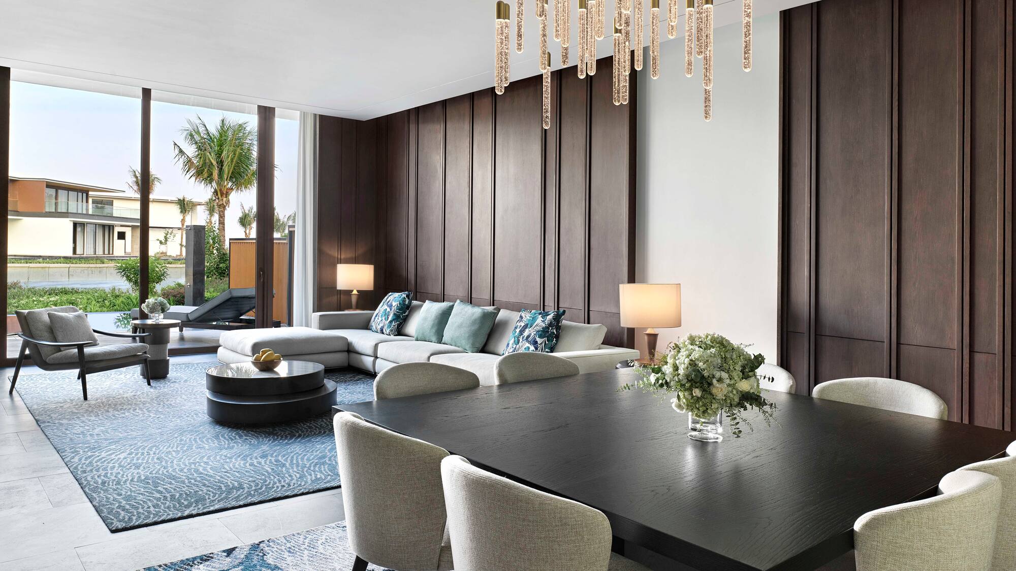 a room with a large table and chairs