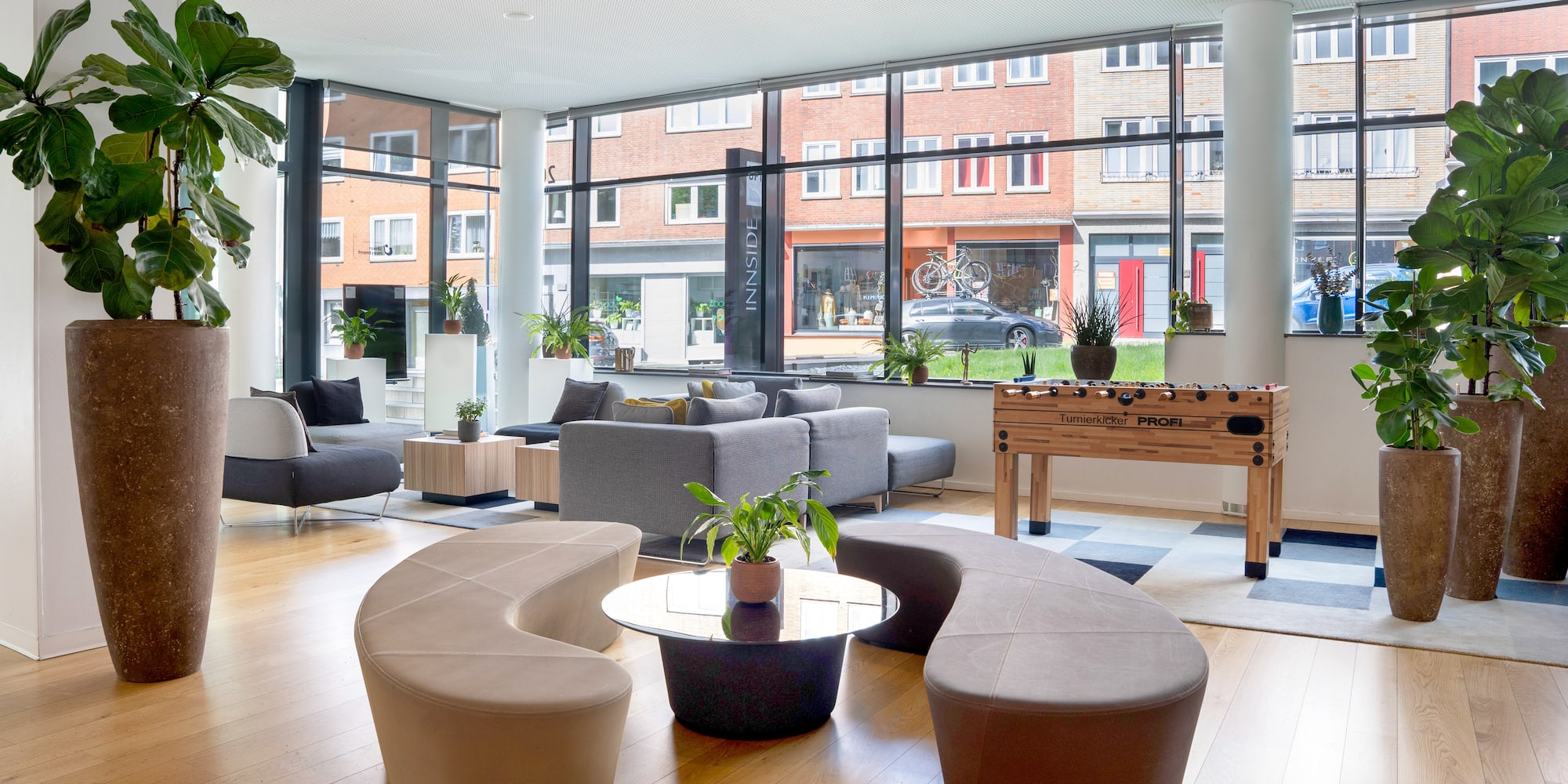 a room with couches and tables