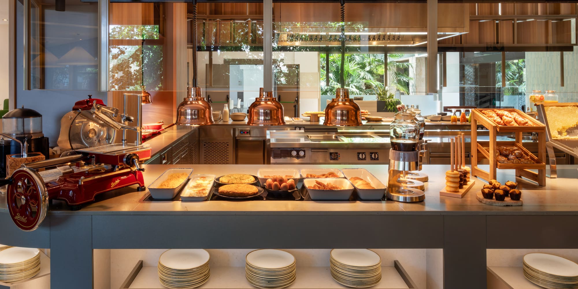 a kitchen with a counter top and plates