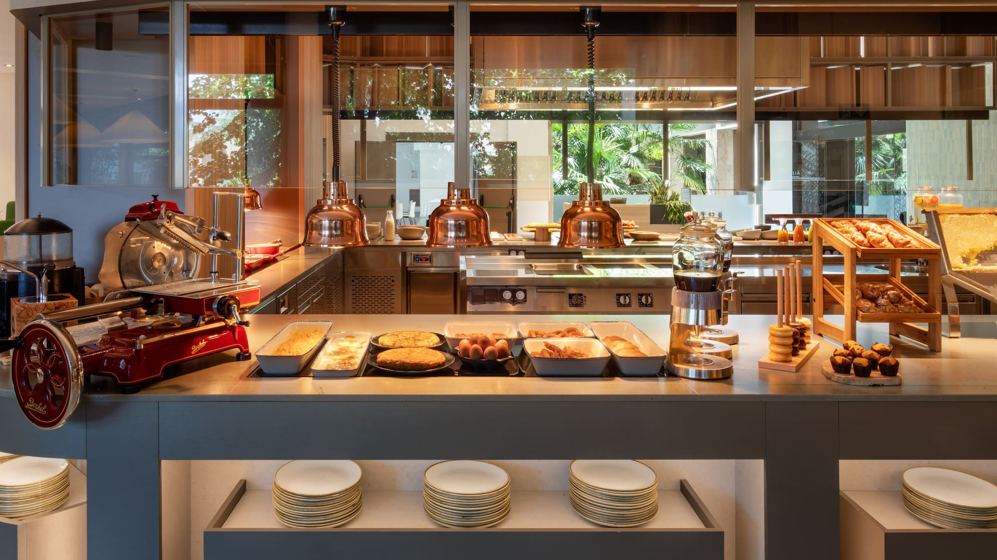 a kitchen with a counter top and plates