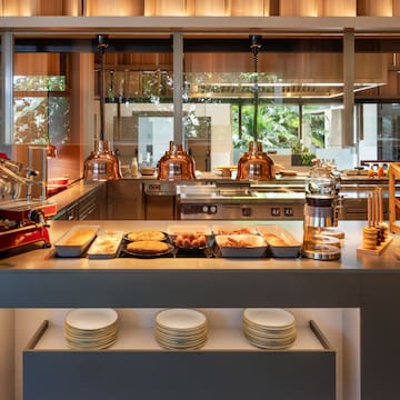 a kitchen with a counter top and plates