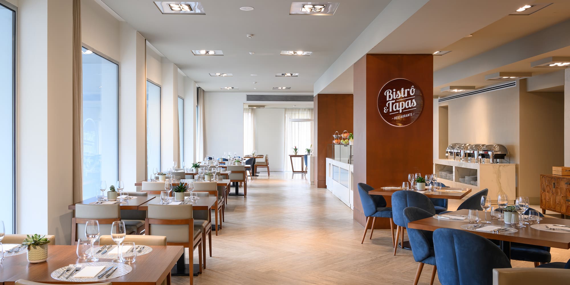 a restaurant with tables and chairs