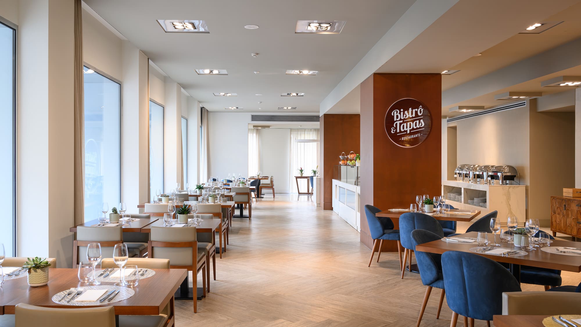 a restaurant with tables and chairs