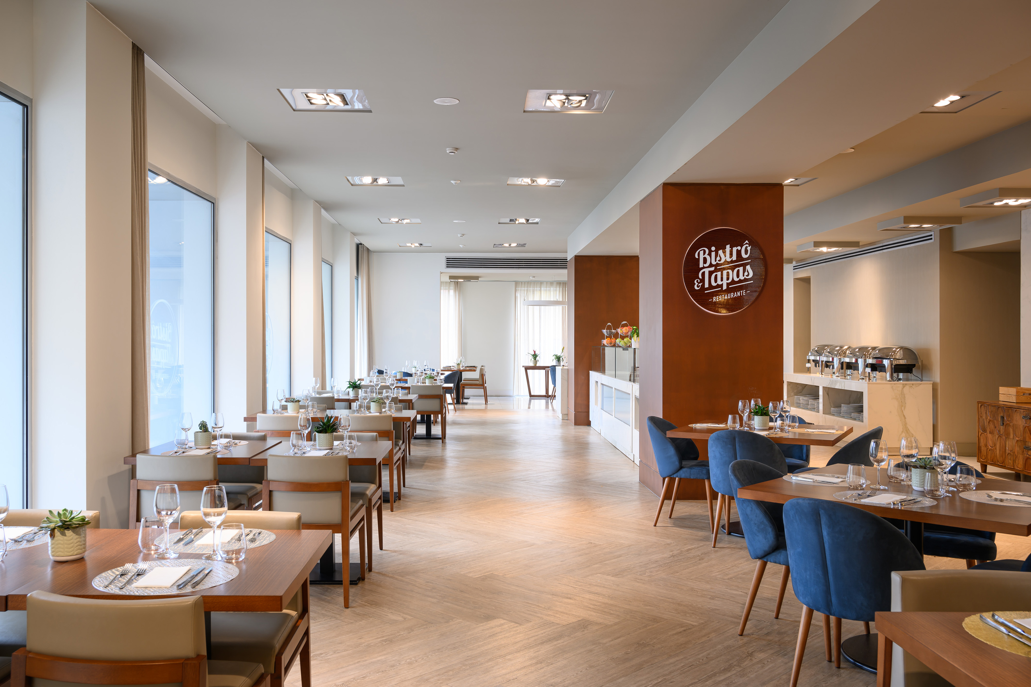 a restaurant with tables and chairs