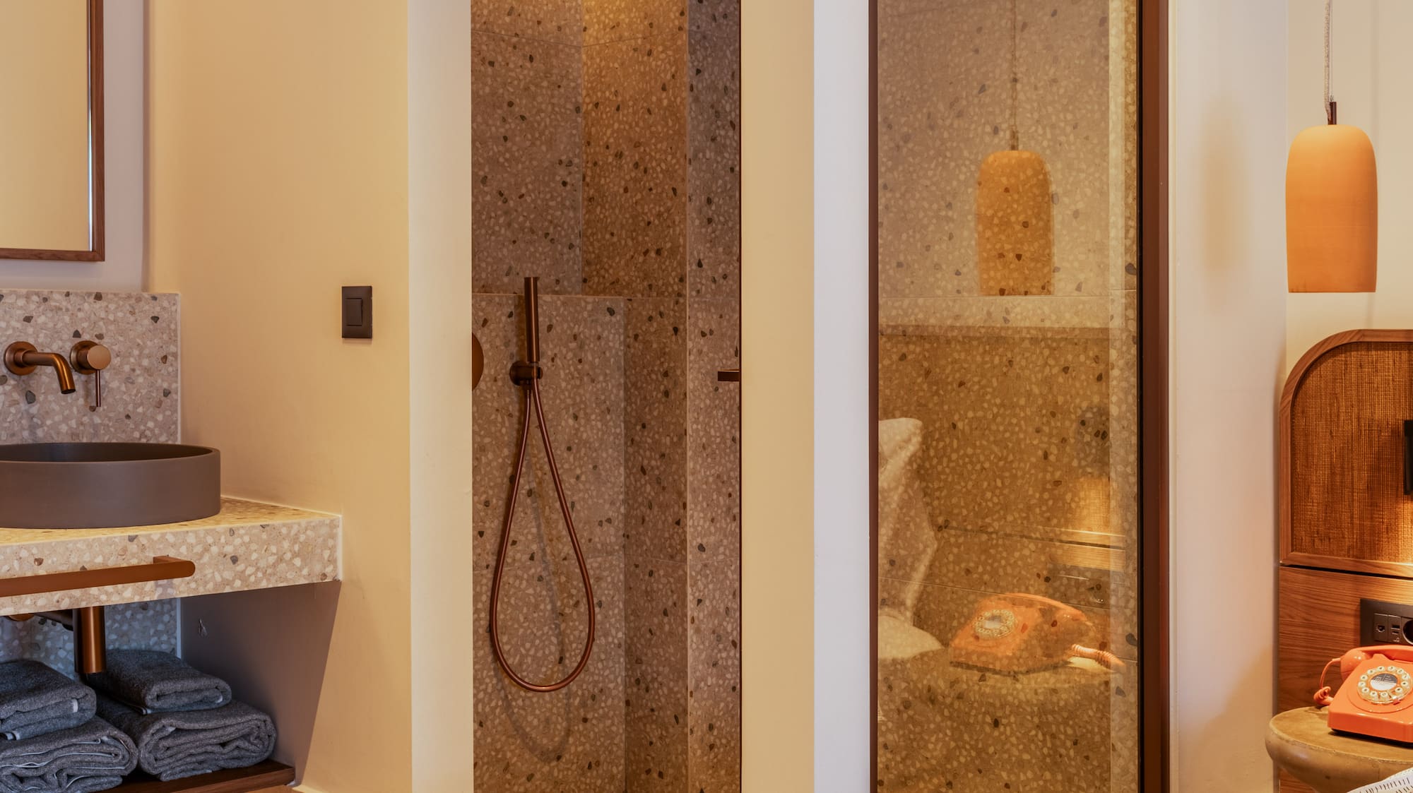 a bathroom with a shower and sink