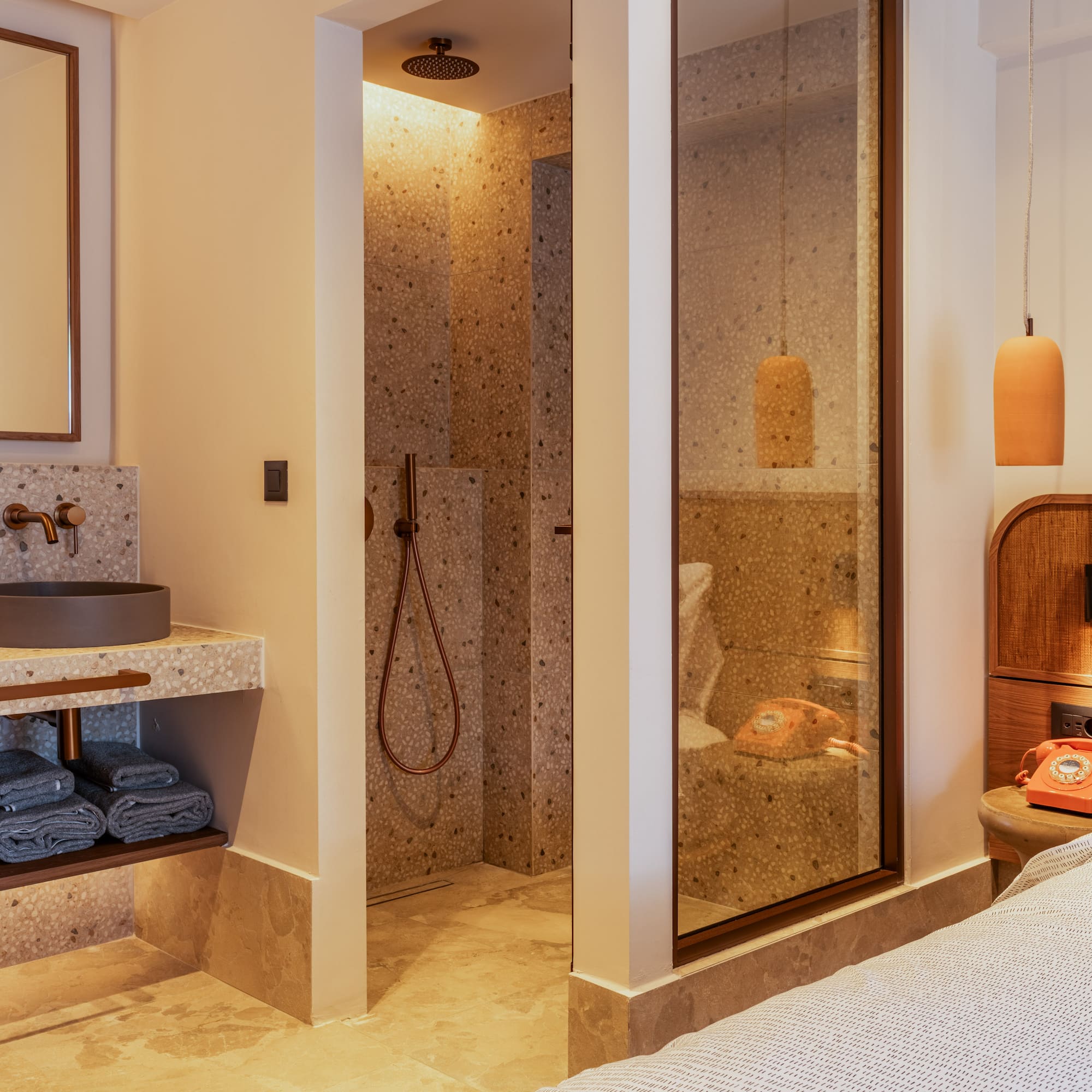 a bathroom with a shower and sink